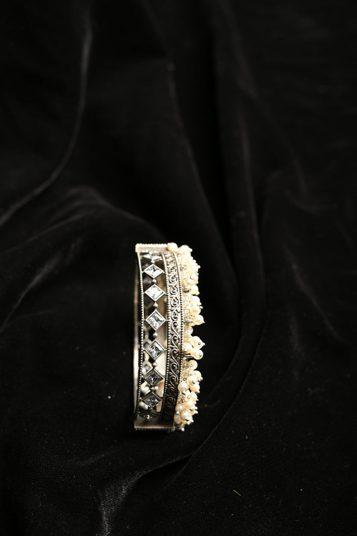 White Fiza Bangle in Brass-stones and pearls with an Antique Silver Polish | SHOBITAM