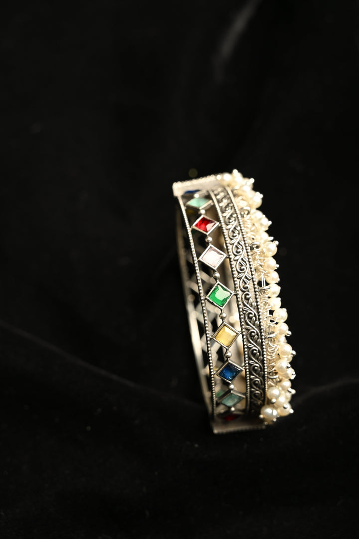 Multicolor Fiza Bangle in Brass-stones and pearls with an Antique Silver Polish