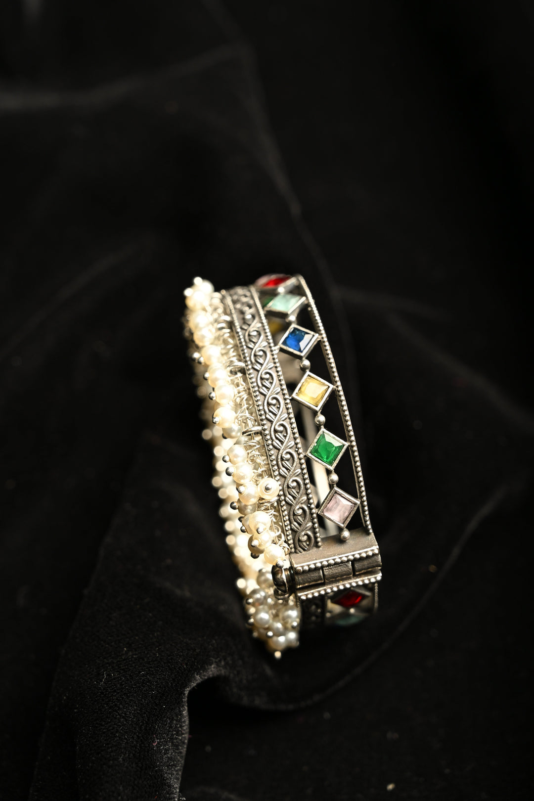 Multicolor Fiza Bangle in Brass-stones and pearls with an Antique Silver Polish