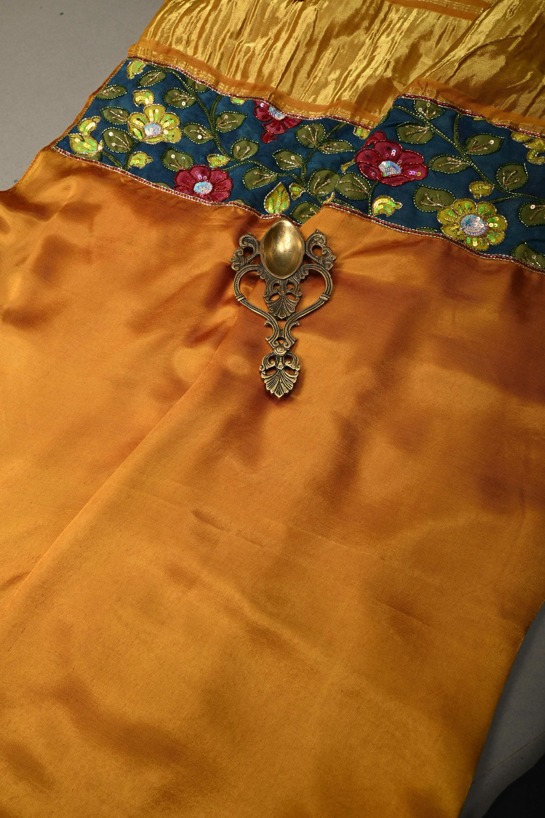 Ochre Sequins-Cutdana Hand Embroidery on Modal Silk Saree with Kalamkari Applique work and Lagda Patta Crushed Tissue Pallu | SHOBITAM