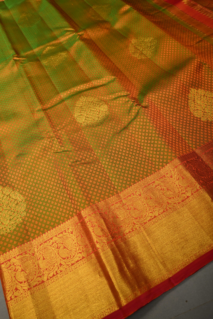 Henna Green Dual tone Self Brocade Kanjivaram Pure Silk Saree with Zari Buttas and Zari Border | SILK MARK CERTIFIED | SHOBITAM