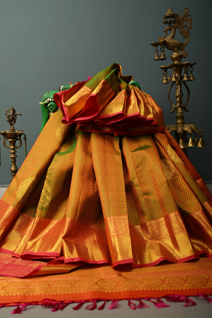 Henna Green Dual tone Self Brocade Kanjivaram Pure Silk Saree with Zari Buttas and Zari Border | SILK MARK CERTIFIED | SHOBITAM