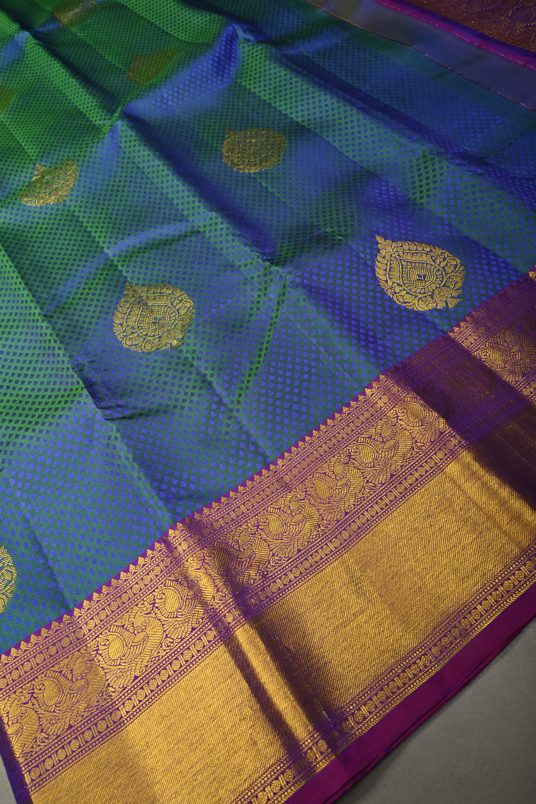 Peacock Blue-Green Dual Tone Self Brocade on Pure Kanjivaram Silk Handloom Saree with Damask Buttas and Contrast Zari Border| SILK MARK CERTIFIED | SHOBITAM