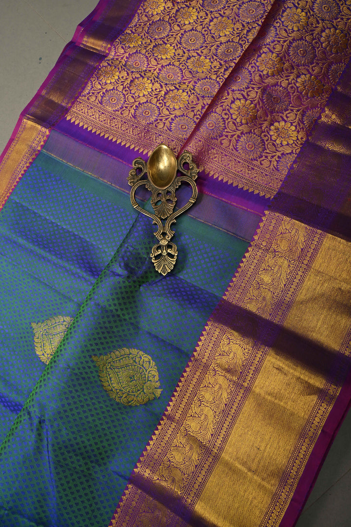 Peacock Blue-Green Dual Tone Self Brocade on Pure Kanjivaram Silk Handloom Saree with Damask Buttas and Contrast Zari Border| SILK MARK CERTIFIED | SHOBITAM