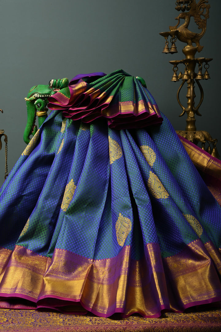 Peacock Blue-Green Dual Tone Self Brocade on Pure Kanjivaram Silk Handloom Saree with Damask Buttas and Contrast Zari Border| SILK MARK CERTIFIED | SHOBITAM