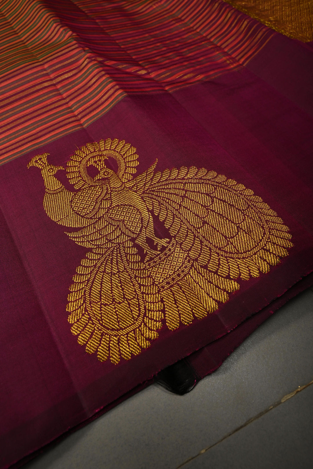 Multicolor Pure Kanjivaram Silk Handloom Saree with Horizontal Stripes and Distinct Twin Peacock Zari Motifs on Plum Border  | SILK MARK CERTIFIED | SHOBITAM
