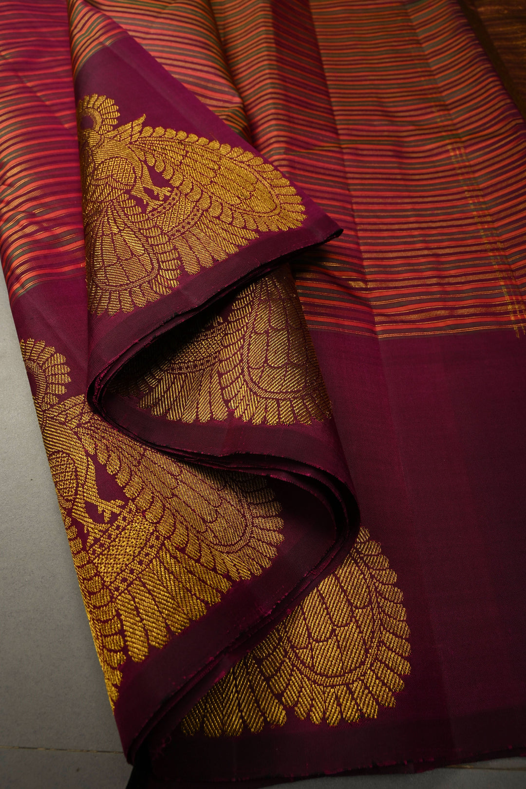 Multicolor Pure Kanjivaram Silk Handloom Saree with Horizontal Stripes and Distinct Twin Peacock Zari Motifs on Plum Border  | SILK MARK CERTIFIED | SHOBITAM