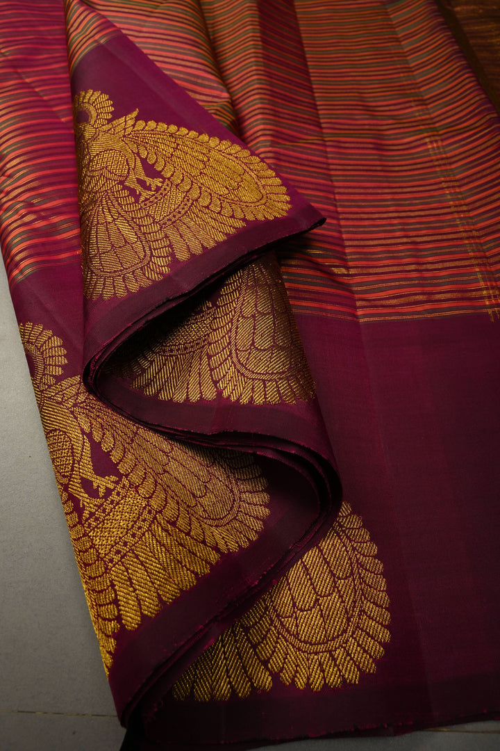Multicolor Pure Kanjivaram Silk Handloom Saree with Horizontal Stripes and Distinct Twin Peacock Zari Motifs on Plum Border  | SILK MARK CERTIFIED | SHOBITAM