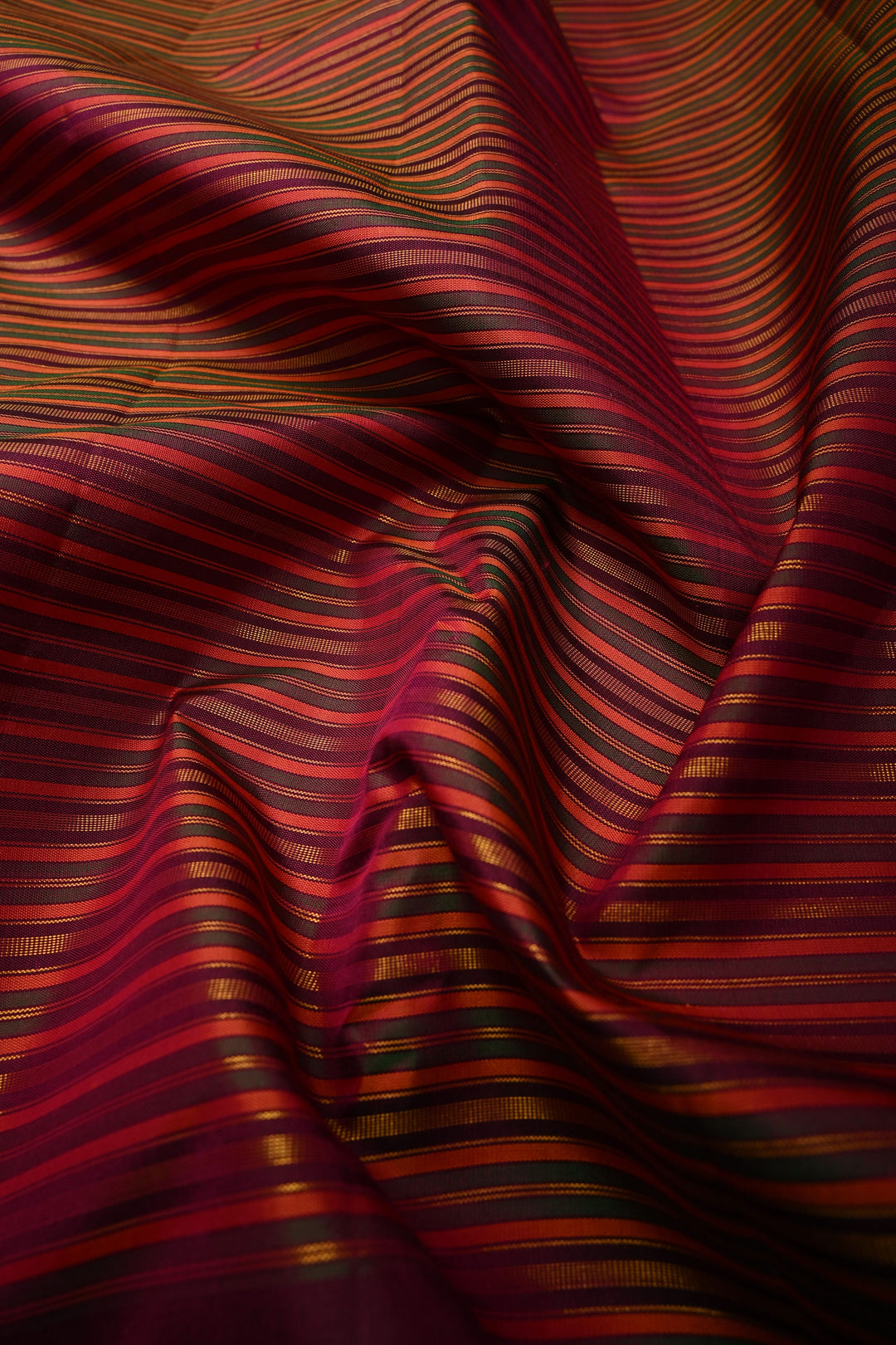Multicolor Pure Kanjivaram Silk Handloom Saree with Horizontal Stripes and Distinct Twin Peacock Zari Motifs on Plum Border  | SILK MARK CERTIFIED | SHOBITAM