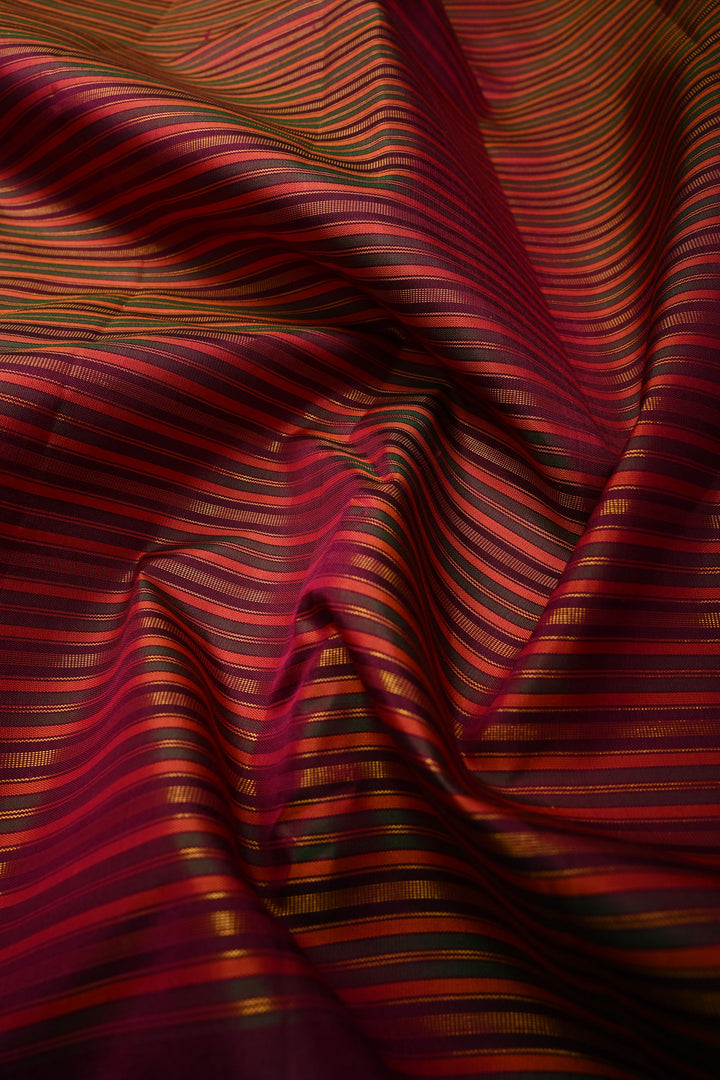 Multicolor Pure Kanjivaram Silk Handloom Saree with Horizontal Stripes and Distinct Twin Peacock Zari Motifs on Plum Border  | SILK MARK CERTIFIED | SHOBITAM