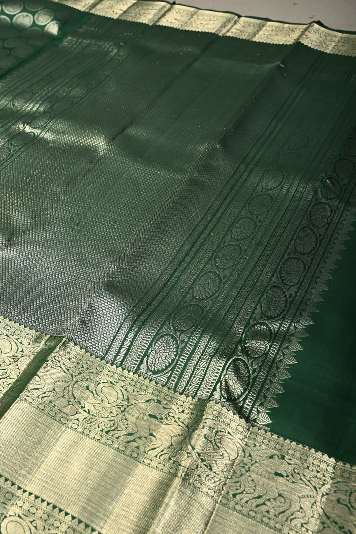 Forest Green Pure Kanjivaram Silk Saree with Peacock Siver Zari Brocade and Wide Zari Border | SILK MARK CERTIFIED | SHOBITAM