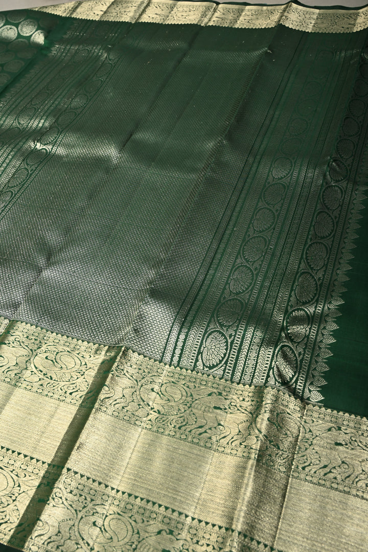 Forest Green Pure Kanjivaram Silk Saree with Peacock Siver Zari Brocade and Wide Zari Border | SILK MARK CERTIFIED | SHOBITAM