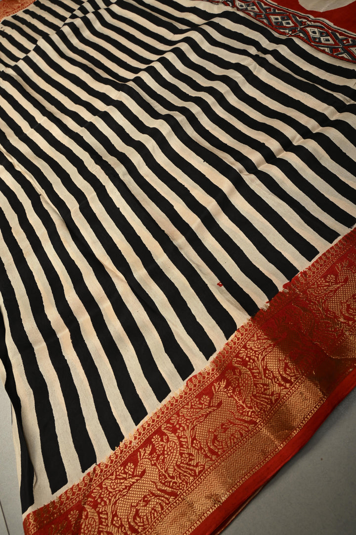 Black-White Dola Silk Saree with Stripes Hand Block Print and Fancy Zari Border, No Blouse Piece | SHOBITAM