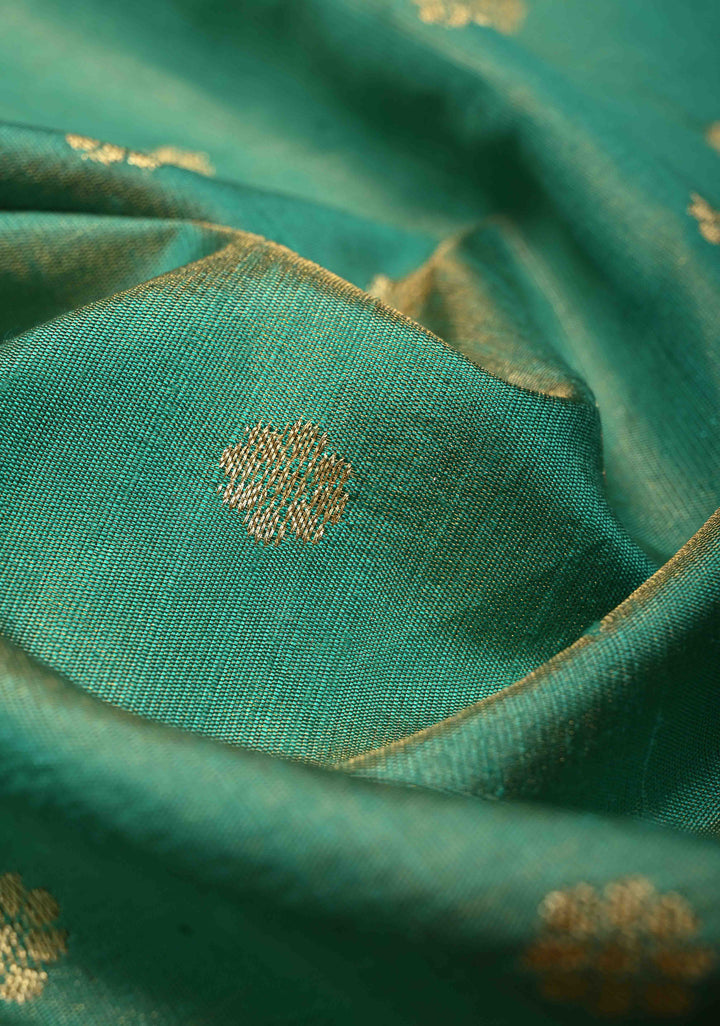 Sea Green Floral Zari Buttas on Pure Tissue Raw Silk Fusion Saree with Paithani Border and Peacock Motifs on Pallu| SHOBITAM
