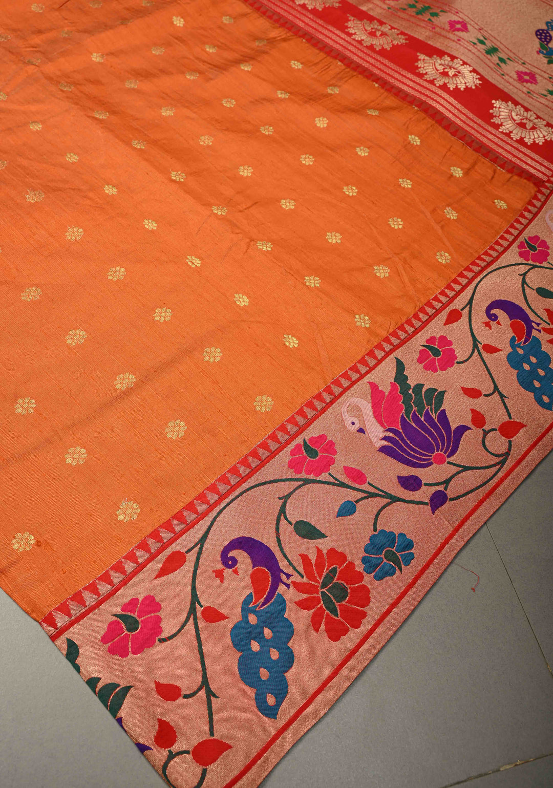 Orange Floral Zari Buttas on Tissue Raw Silk Fusion Saree with Paithani Border and Peacock Motifs on Pallu| SHOBITAM