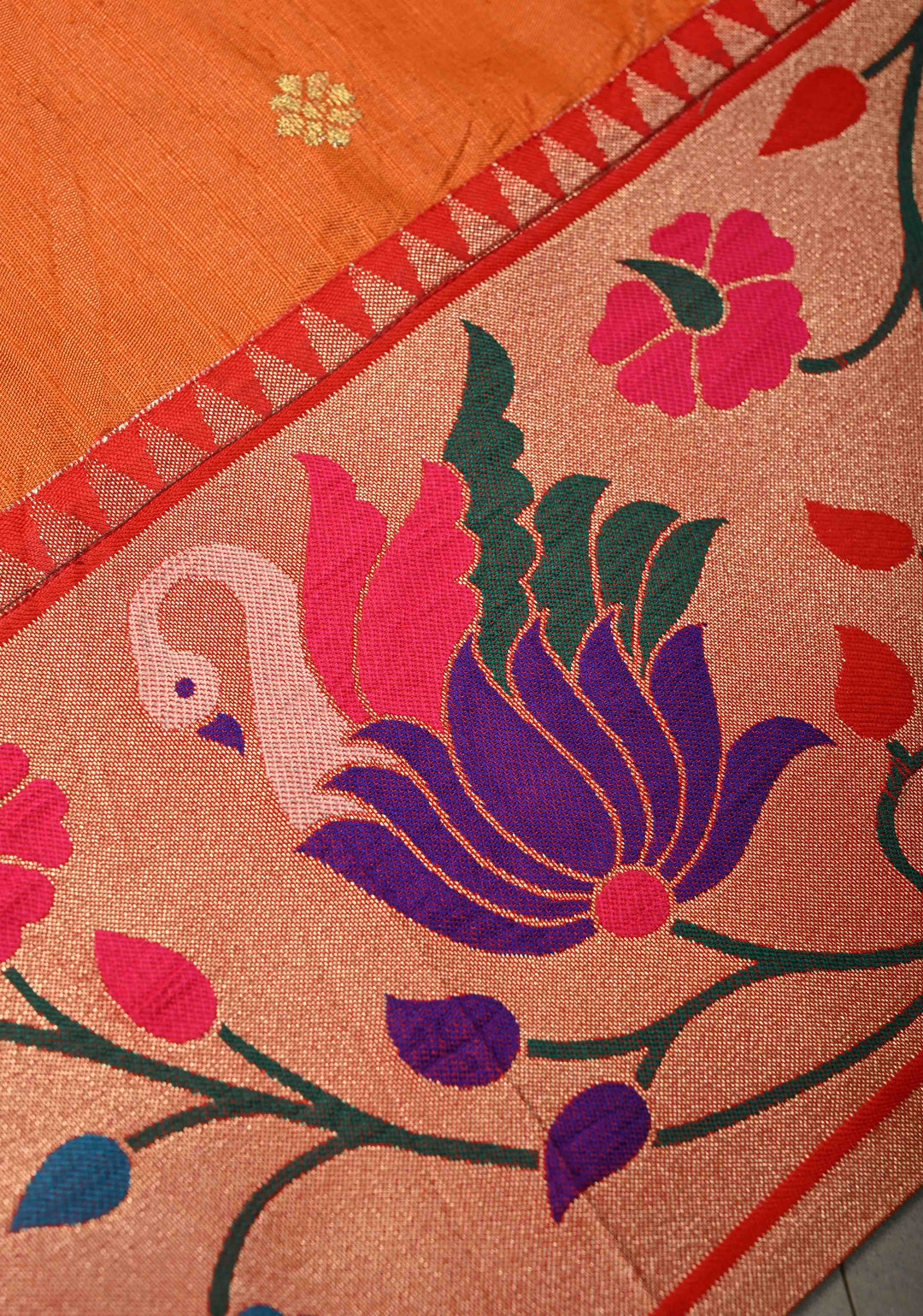 Orange Floral Zari Buttas on Tissue Raw Silk Fusion Saree with Paithani Border and Peacock Motifs on Pallu| SHOBITAM