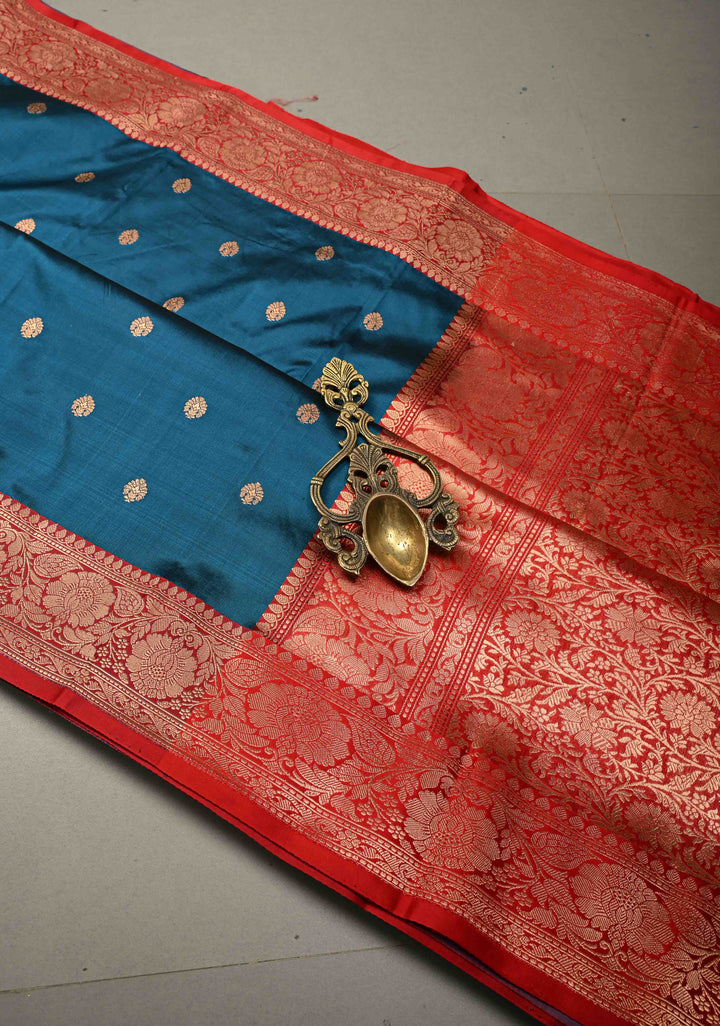 Prussian Blue Banarasi Katan Silk Saree with Floral Zari Buttas and Contrast Zari Border | SILK MARK CERTIFIED | SHOBITAM