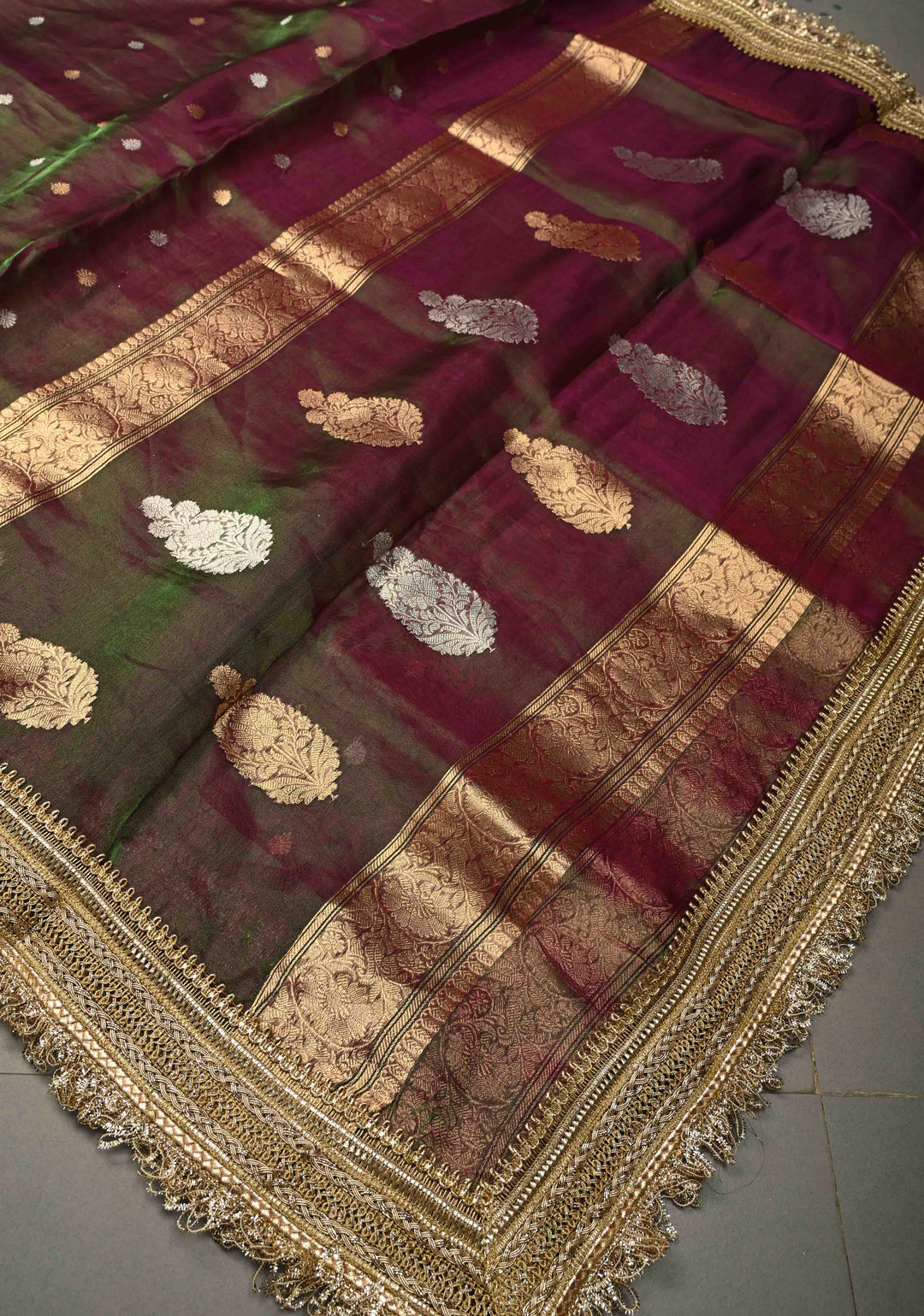 Purple-Green Dual tone Organza Tissue Silk Saree with Sona Rupa Zari Buttas and Fancy Lace Trim Border | SILK MARK CERTIFIED | SHOBITAM