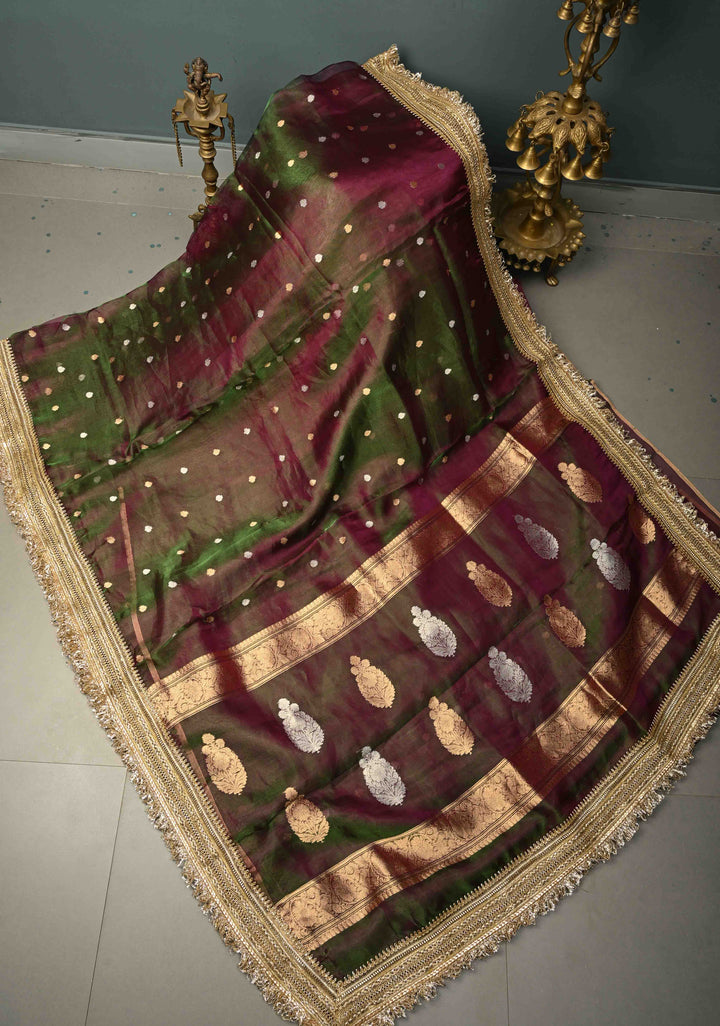 Purple-Green Dual tone Organza Tissue Silk Saree with Sona Rupa Zari Buttas and Fancy Lace Trim Border | SILK MARK CERTIFIED | SHOBITAM