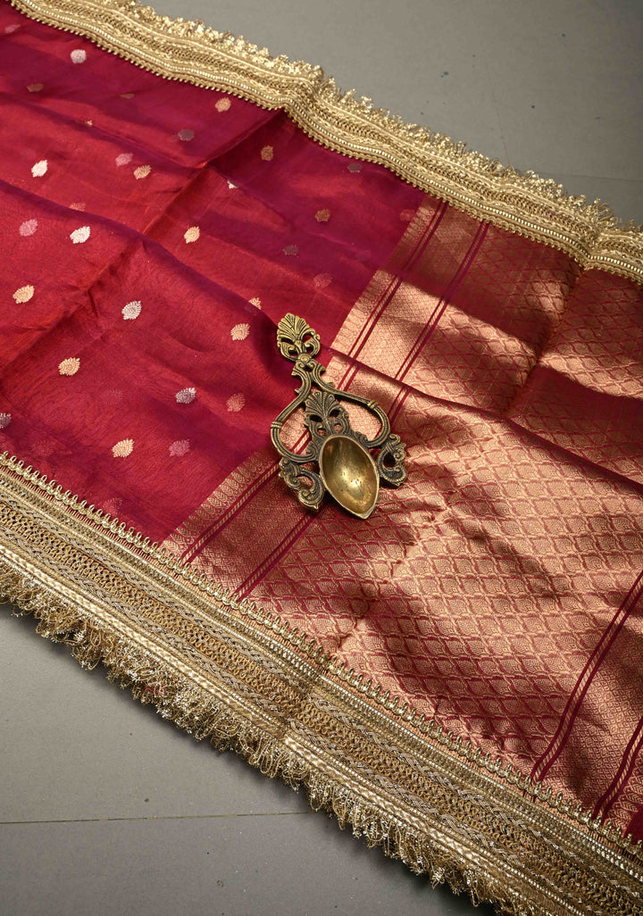 Pink-Maroon Dual Tone Pure Banarasi Organza Tissue Silk Saree with Sona Rupa Floral Zari Buttas and Fancy Trim Lace Border| SILK MARK CERTIFIED | SHOBITAM