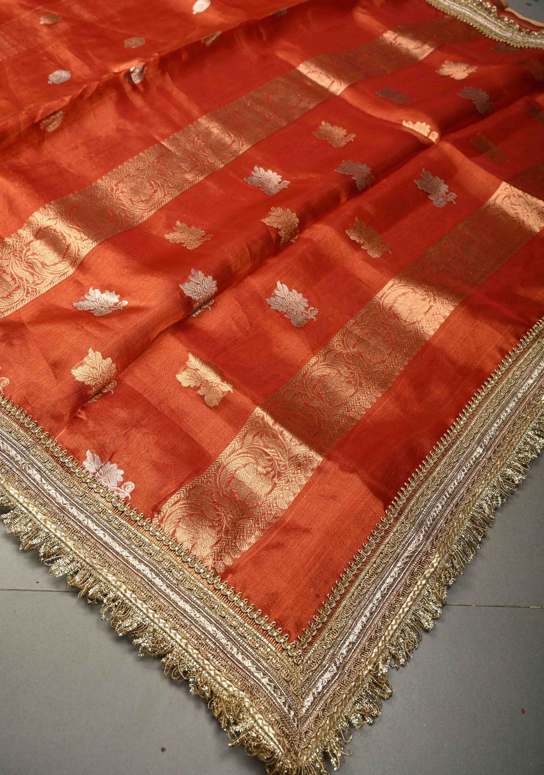 Orange Pure Banarasi Organza Tissue Silk Saree with Sona Rupa Floral Zari Buttas and Fancy Trim Lace Border | SILK MARK CERTIFIED | SHOBITAM