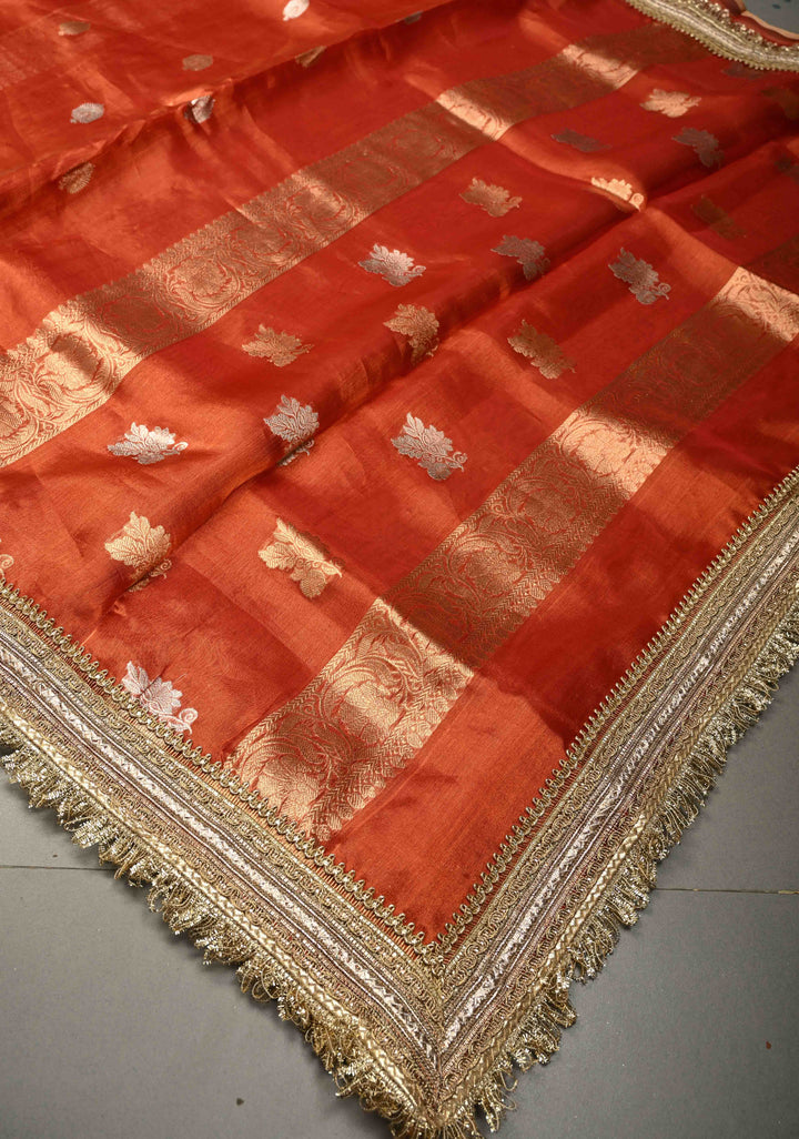 Orange Pure Banarasi Organza Tissue Silk Saree with Sona Rupa Floral Zari Buttas and Fancy Trim Lace Border | SILK MARK CERTIFIED | SHOBITAM