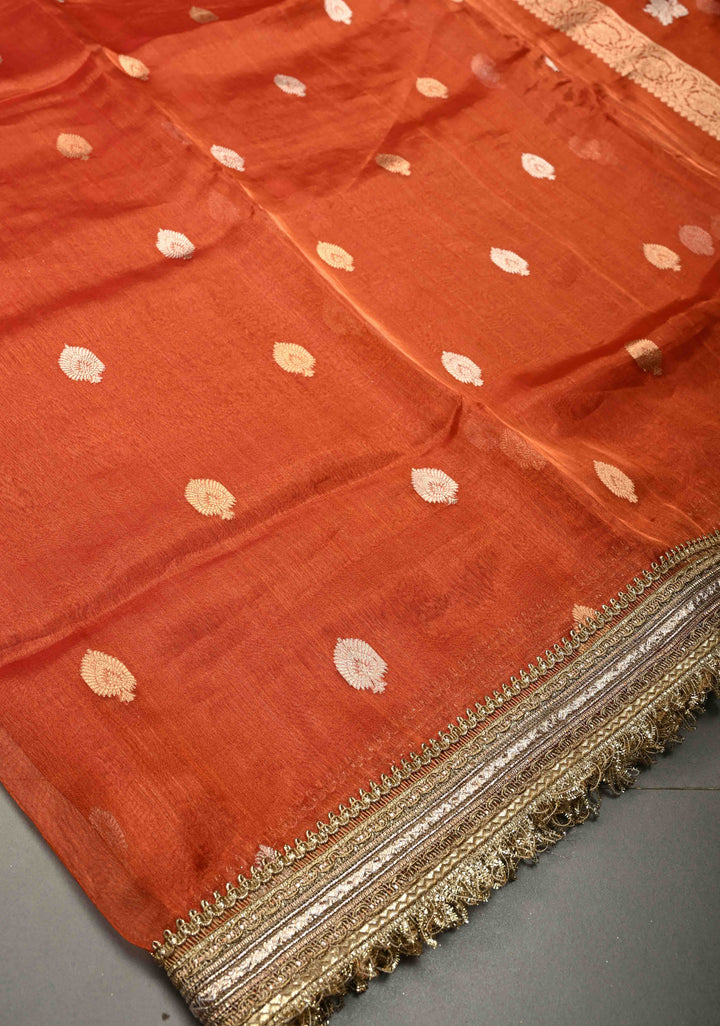 Orange Pure Banarasi Organza Tissue Silk Saree with Sona Rupa Floral Zari Buttas and Fancy Trim Lace Border | SILK MARK CERTIFIED | SHOBITAM