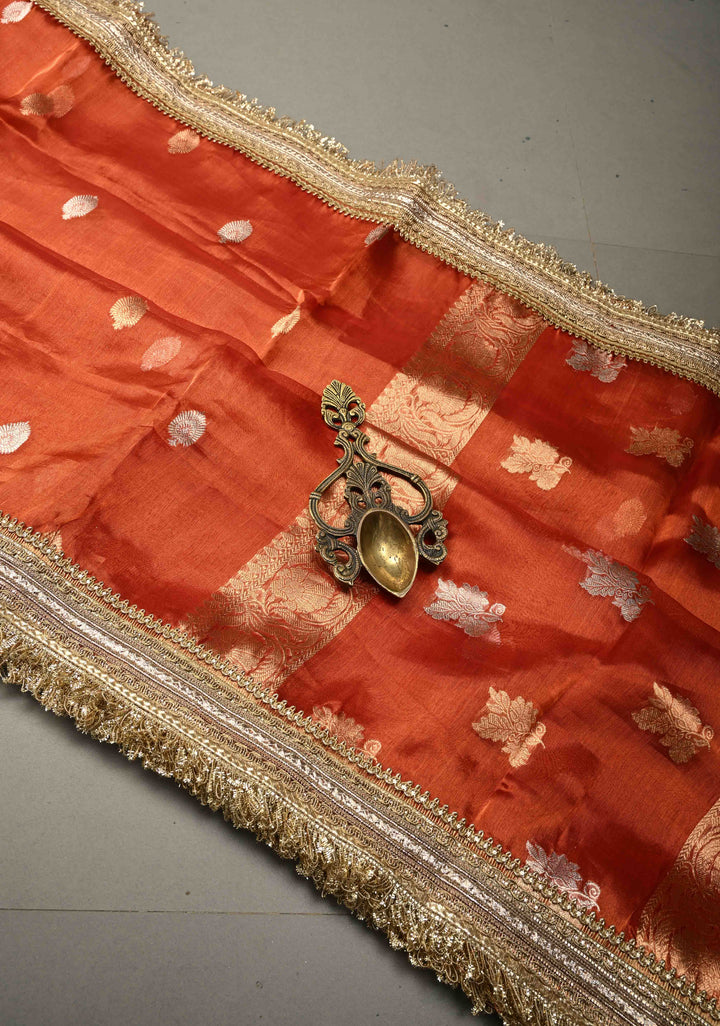 Orange Pure Banarasi Organza Tissue Silk Saree with Sona Rupa Floral Zari Buttas and Fancy Trim Lace Border | SILK MARK CERTIFIED | SHOBITAM