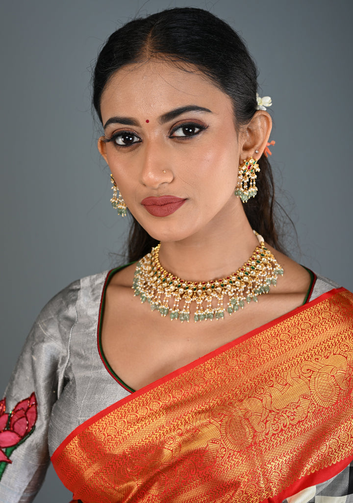 Jadau Choker Set with White and Red Stones and Green Dangling Beads | Shobitam Jewelry