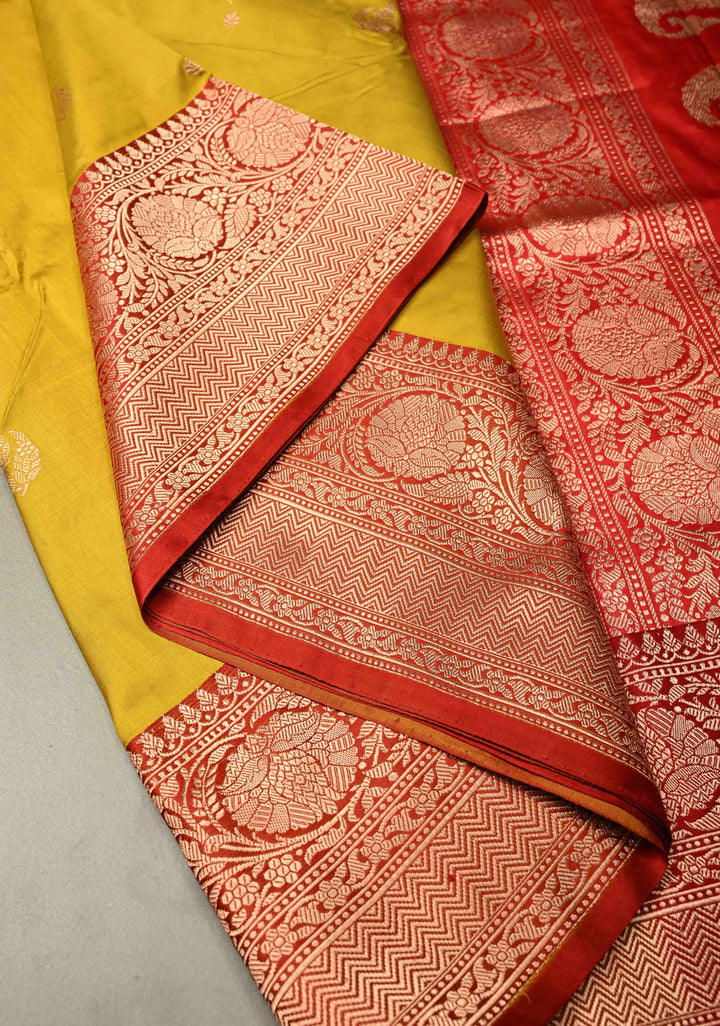 Citrine yellow Banarasi Katan Silk Saree with Floral Zari Buttas and Contrast Zari Border | SILK MARK CERTIFIED | SHOBITAM