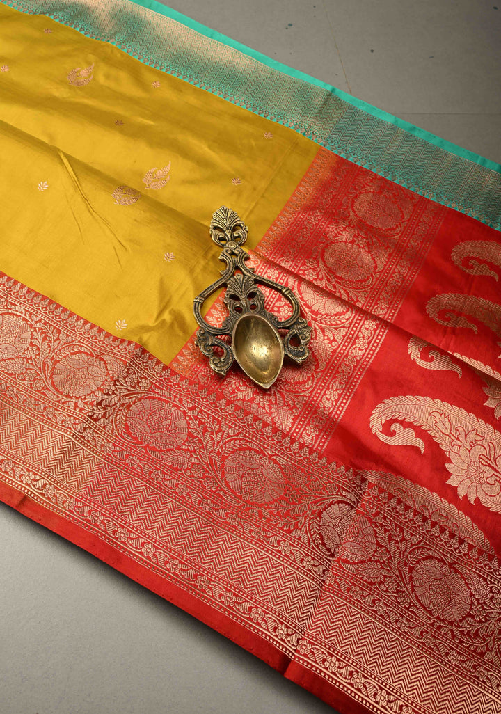 Citrine yellow Banarasi Katan Silk Saree with Floral Zari Buttas and Contrast Zari Border | SILK MARK CERTIFIED | SHOBITAM