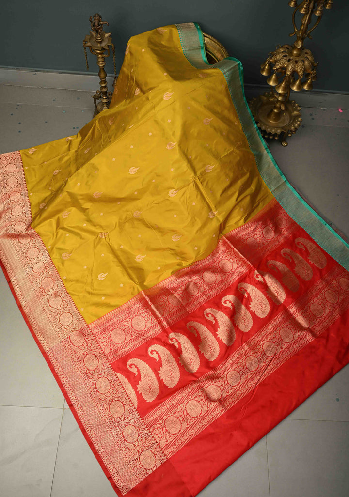 Citrine yellow Banarasi Katan Silk Saree with Floral Zari Buttas and Contrast Zari Border | SILK MARK CERTIFIED | SHOBITAM