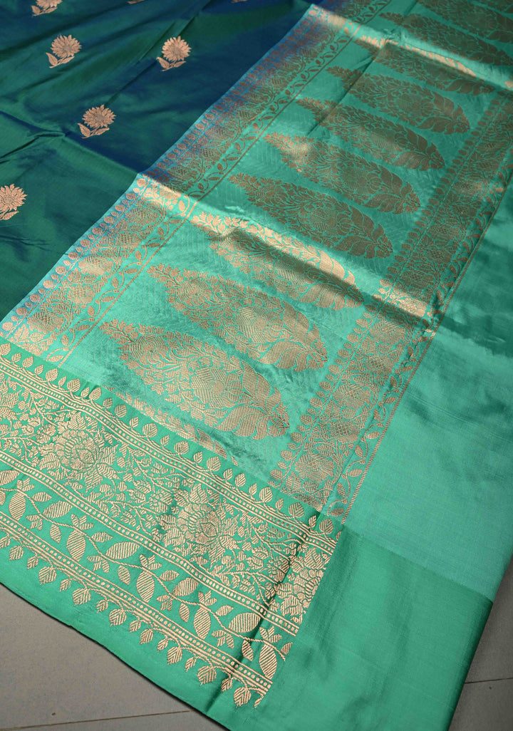 Peacock Green Dual tone Banarasi Katan Silk Saree with Floral Zari Buttas and Contrast Zari Border | SILK MARK CERTIFIED | SHOBITAM
