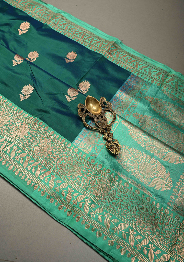 Peacock Green Dual tone Banarasi Katan Silk Saree with Floral Zari Buttas and Contrast Zari Border | SILK MARK CERTIFIED | SHOBITAM