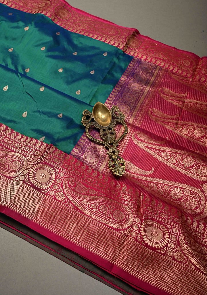 Peacock Blue-Green Dual Tone Banarasi Katan Silk Saree with Floral Zari Buttas and Contrast Zari Border | SILK MARK CERTIFIED | SHOBITAM