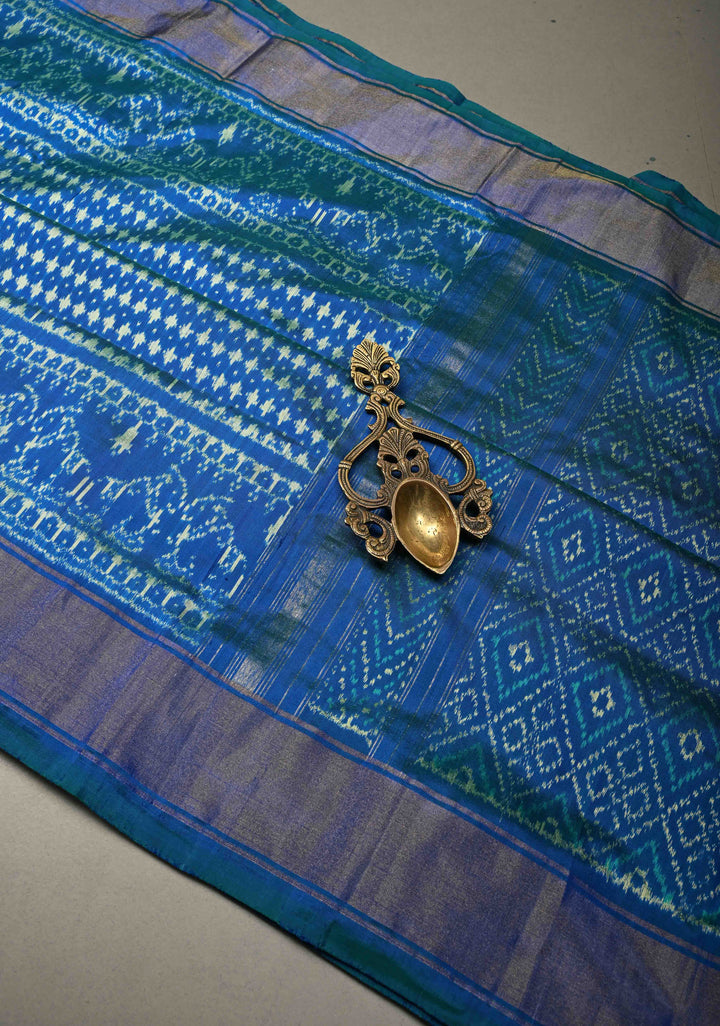 Blue-Green Dual tone Pochampally Ikkat Pure Silk Saree with Twill Design and Nandi Motifs on Tissue Zari Border  | SILK MARK CERTIFIED | SHOBITAM
