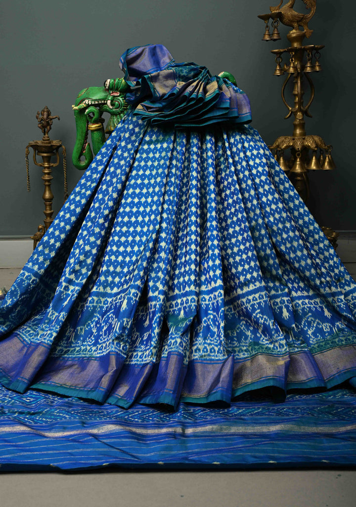Blue-Green Dual tone Pochampally Ikkat Pure Silk Saree with Twill Design and Nandi Motifs on Tissue Zari Border  | SILK MARK CERTIFIED | SHOBITAM