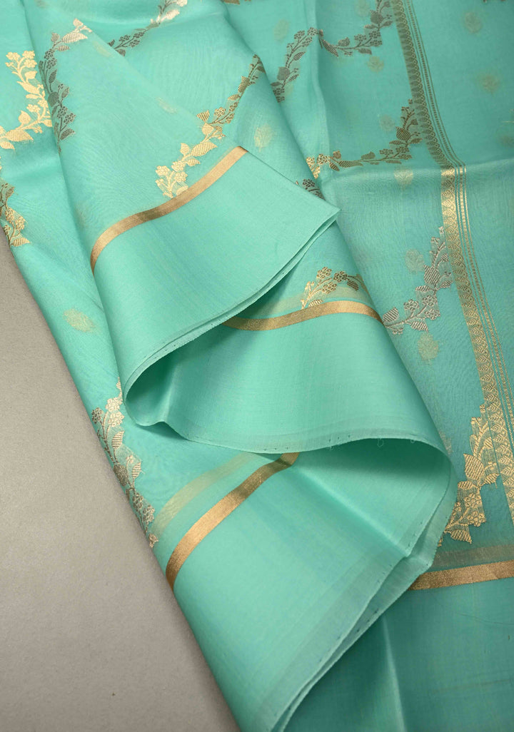 Light Mint Green Pure Banarasi Kora Silk Saree with Sona Rupa Leheria Design and Minimal Zari Border | SILK MARK CERTIFIED | SHOBITAM