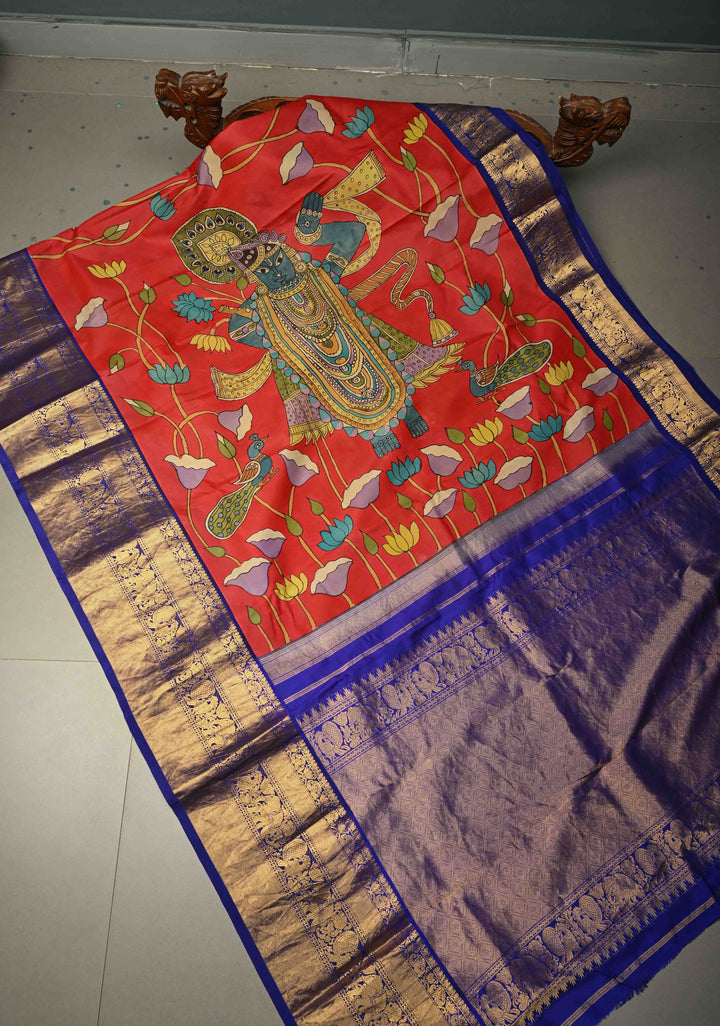 Pichwai and Srinathji Theme : Authentic Pen Kalamkari Handpainted on Pure Kanjivaram Silk Saree with Contrast Zari Border | SILK MARK CERTIFIED | SHOBITAM