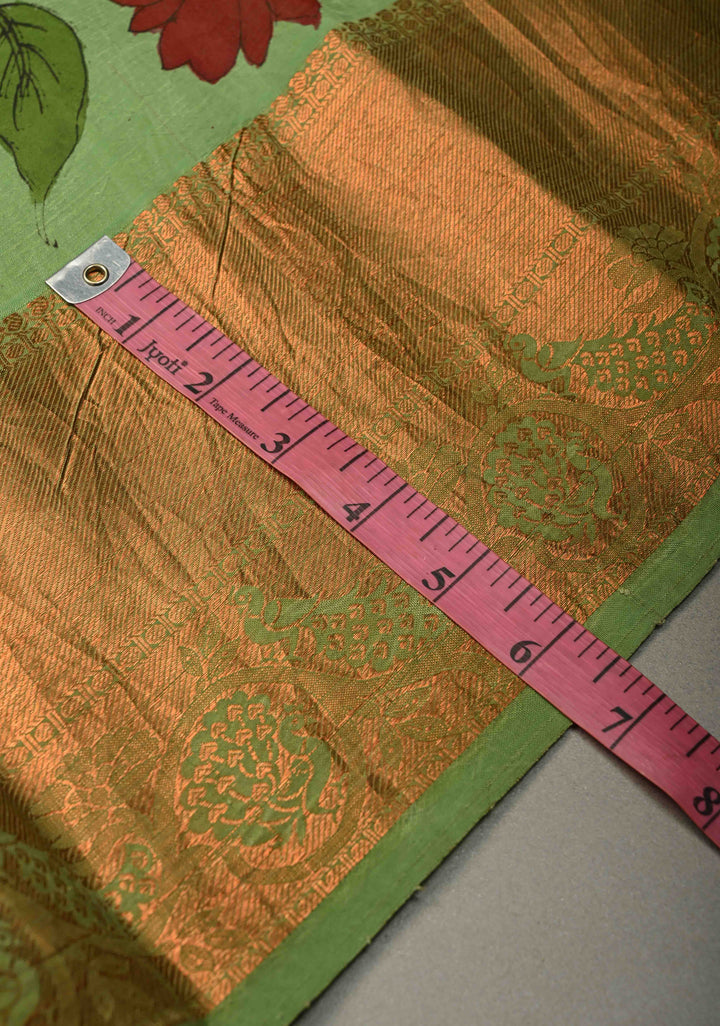 Floral Theme :  Pastel Green Kalamkari on Pure Kanjivaram Silk Saree with Contrast Zari Border | SILK MARK CERTIFIED | SHOBITAM