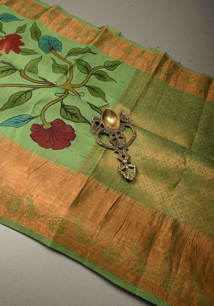 Floral Theme :  Pastel Green Kalamkari on Pure Kanjivaram Silk Saree with Contrast Zari Border | SILK MARK CERTIFIED | SHOBITAM