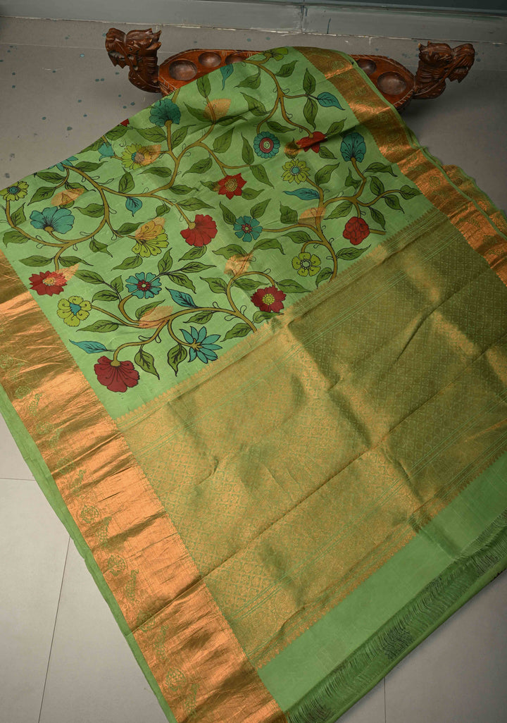 Floral Theme :  Pastel Green Kalamkari on Pure Kanjivaram Silk Saree with Contrast Zari Border | SILK MARK CERTIFIED | SHOBITAM