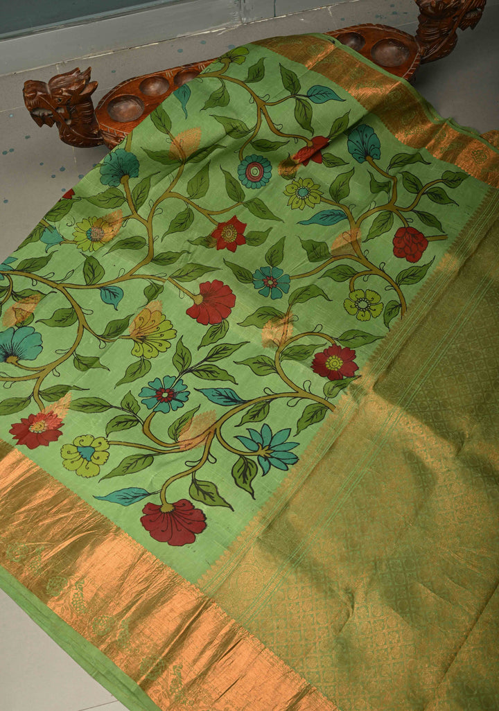 Floral Theme :  Pastel Green Kalamkari on Pure Kanjivaram Silk Saree with Contrast Zari Border | SILK MARK CERTIFIED | SHOBITAM