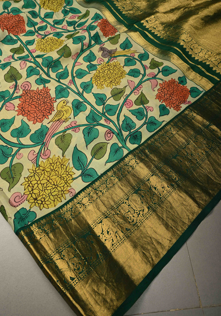Floral Theme : Beige Authentic Pen Kalamkari Handpainted on Pure Kanjivaram Silk Saree with Contrast Zari Border | SILK MARK CERTIFIED | SHOBITAM