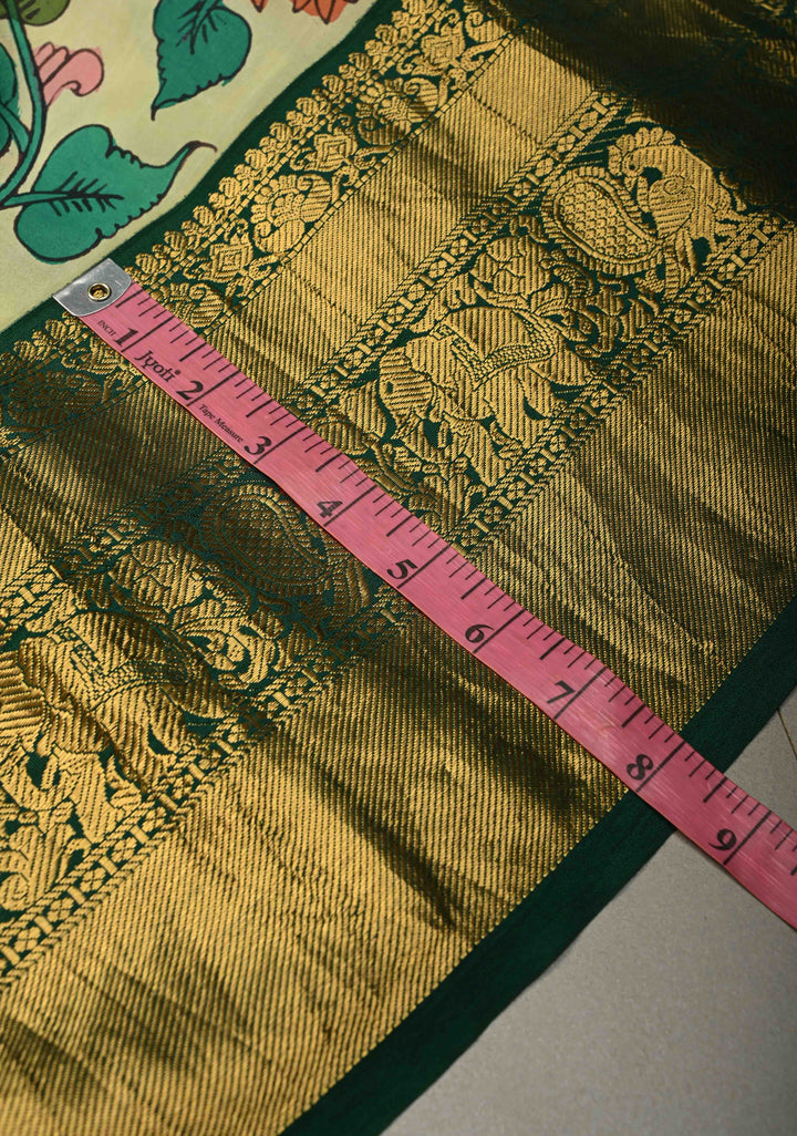 Floral Theme : Beige Authentic Pen Kalamkari Handpainted on Pure Kanjivaram Silk Saree with Contrast Zari Border | SILK MARK CERTIFIED | SHOBITAM
