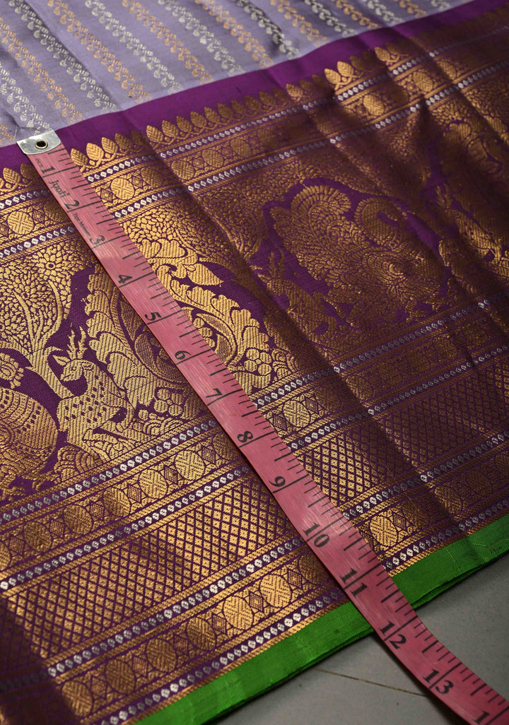 Dusty Lilac Dual tone Pure Gadwal Silk Saree with Gold & Silver Ornate Zari Stripes and 12" Contrast Wide Zari Border | SILK MARK CERTIFIED | SHOBITAM