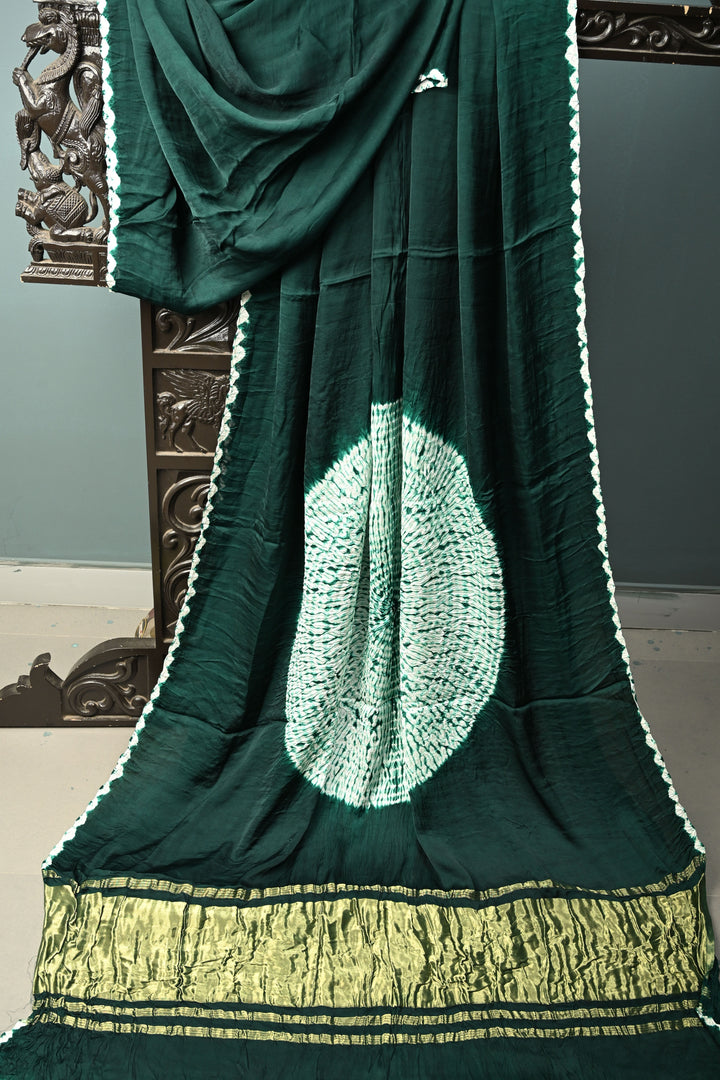 Hand Shibori Dye on Dark Green Modal Silk Saree withlagda Zari Pallu | SHOBITAM