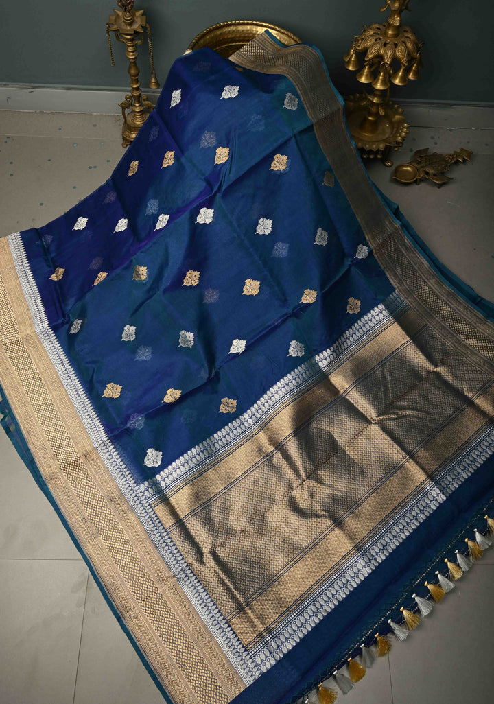 Peacock Blue Dual tone Pure Banarasi Kora Silk Saree with Sona Rupa Floral Buttas and Zari Border | SILK MARK CERTIFIED | SHOBITAM