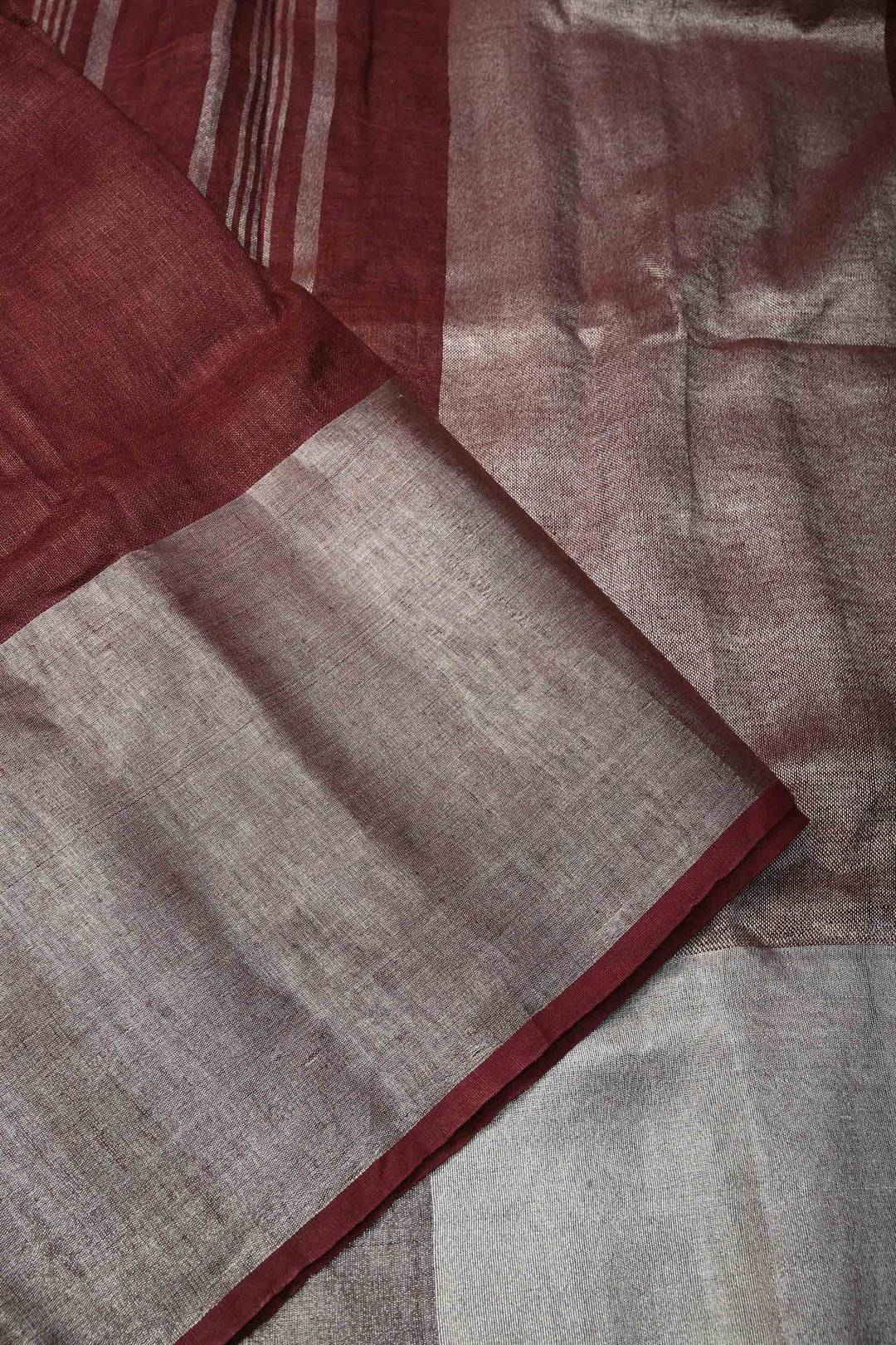 Maroon Linen Saree with Silver Zari Border | SHOBITAM