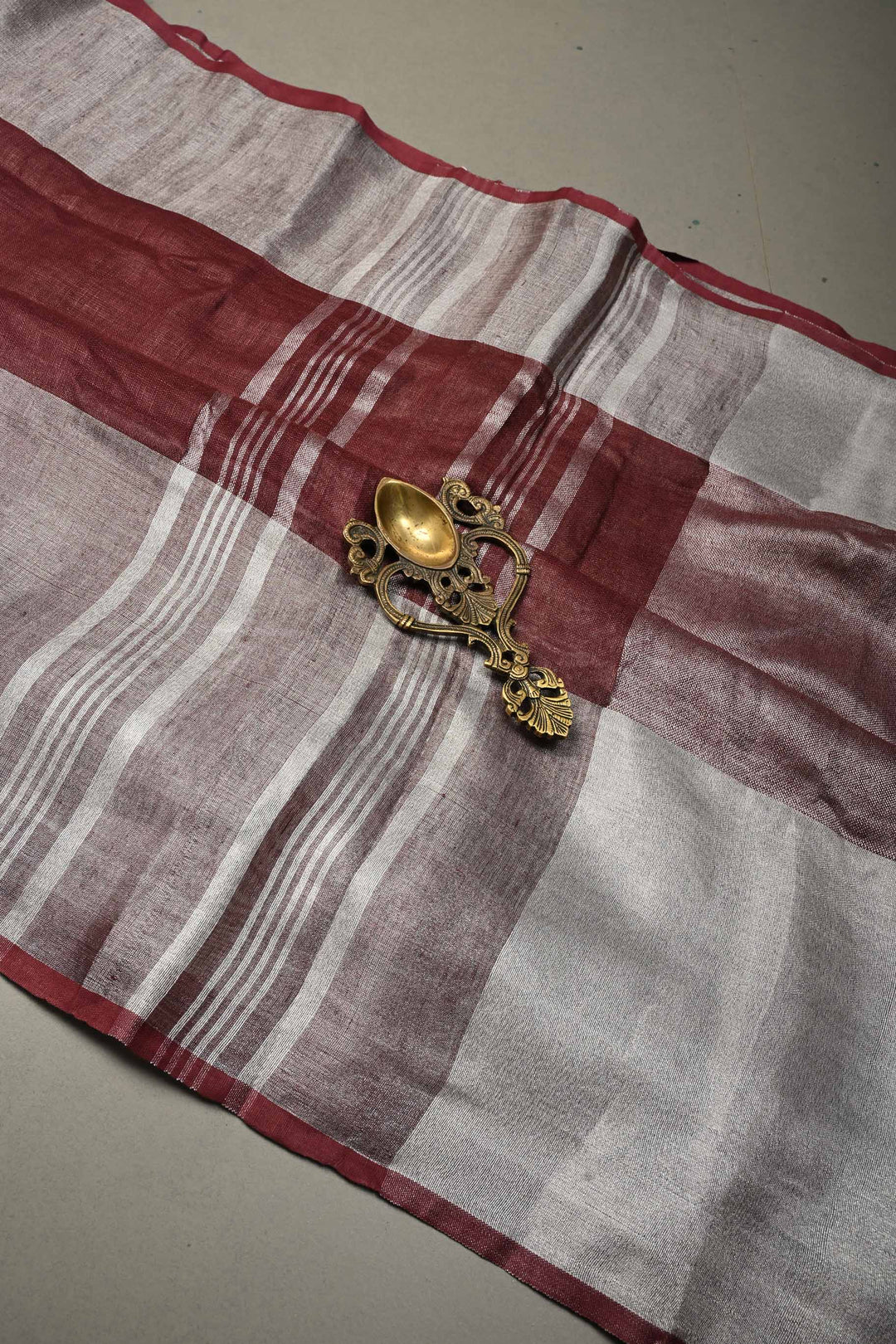 Maroon Linen Saree with Silver Zari Border | SHOBITAM